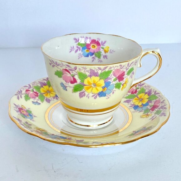 Colclough England Pale Yellow Flowers Teacup and Saucer Bone China Gold Trim Vtg - Picture 1 of 13